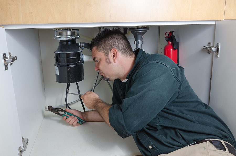 Why Does a Garbage Disposal Hum Without Spinning?